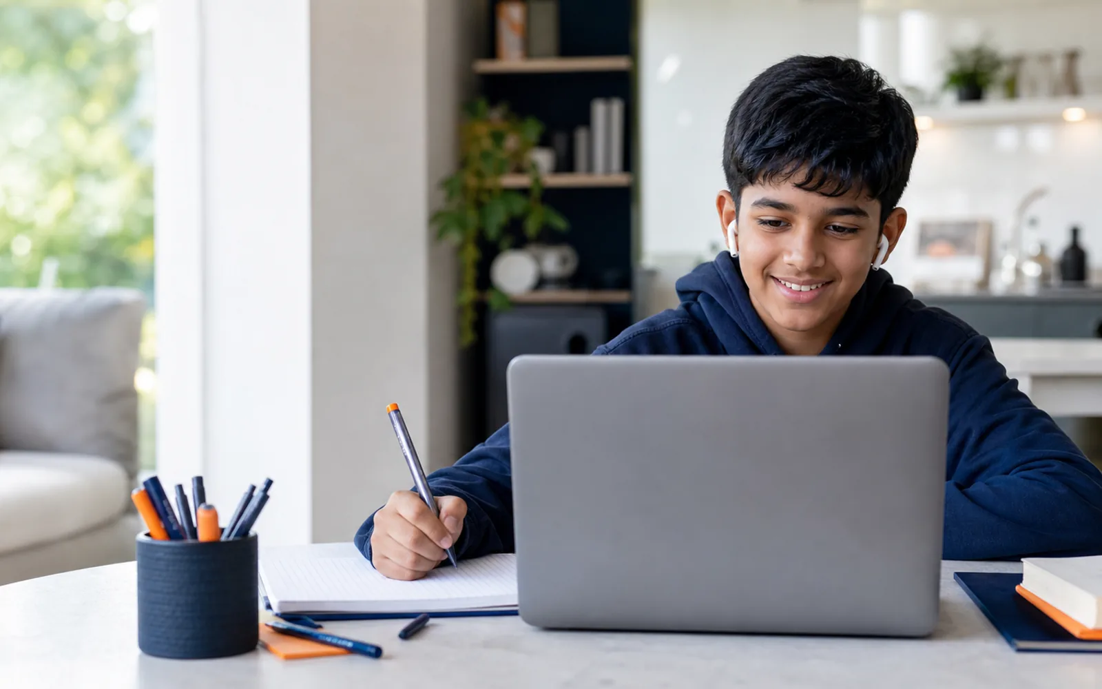 Student working on a laptop during an online lesson